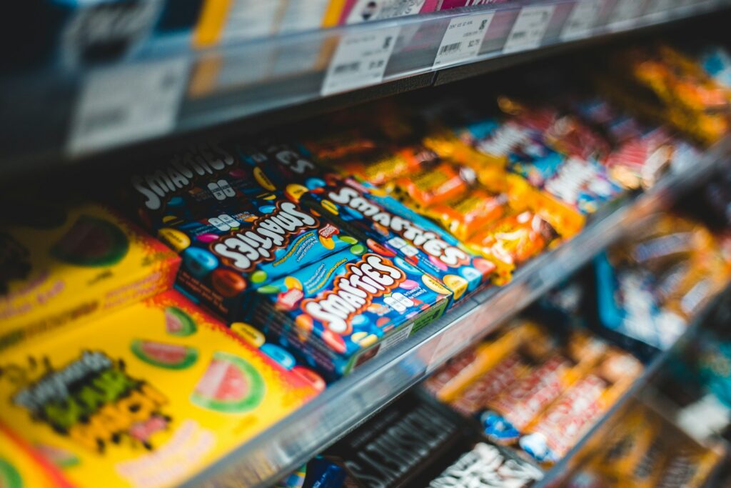 Assorted candy bars display at checkout