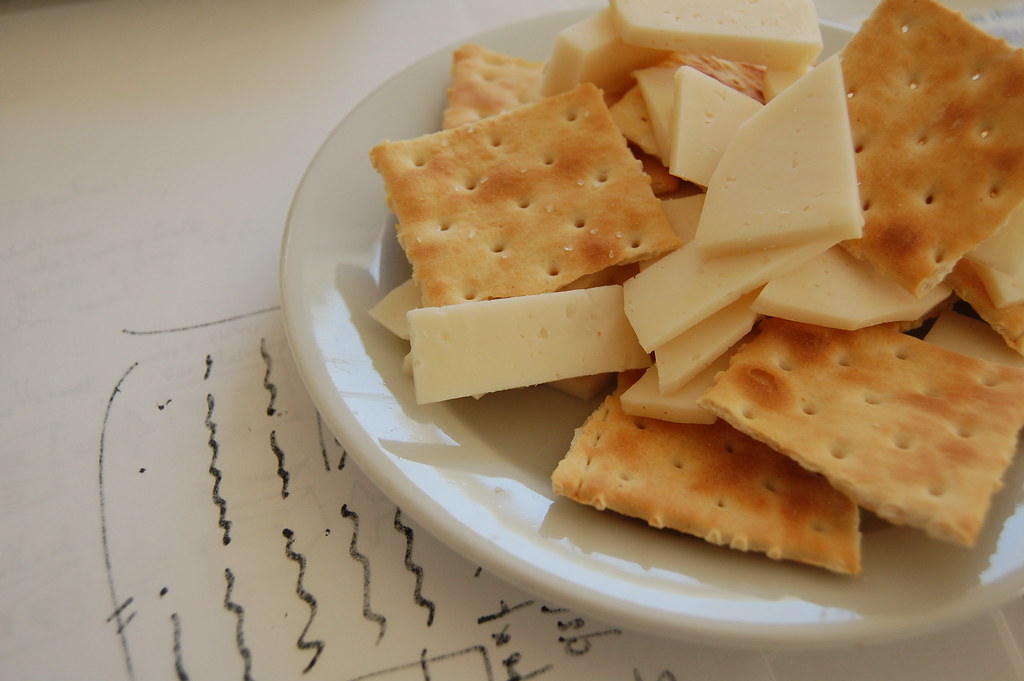 Cheese and crackers snack on a place