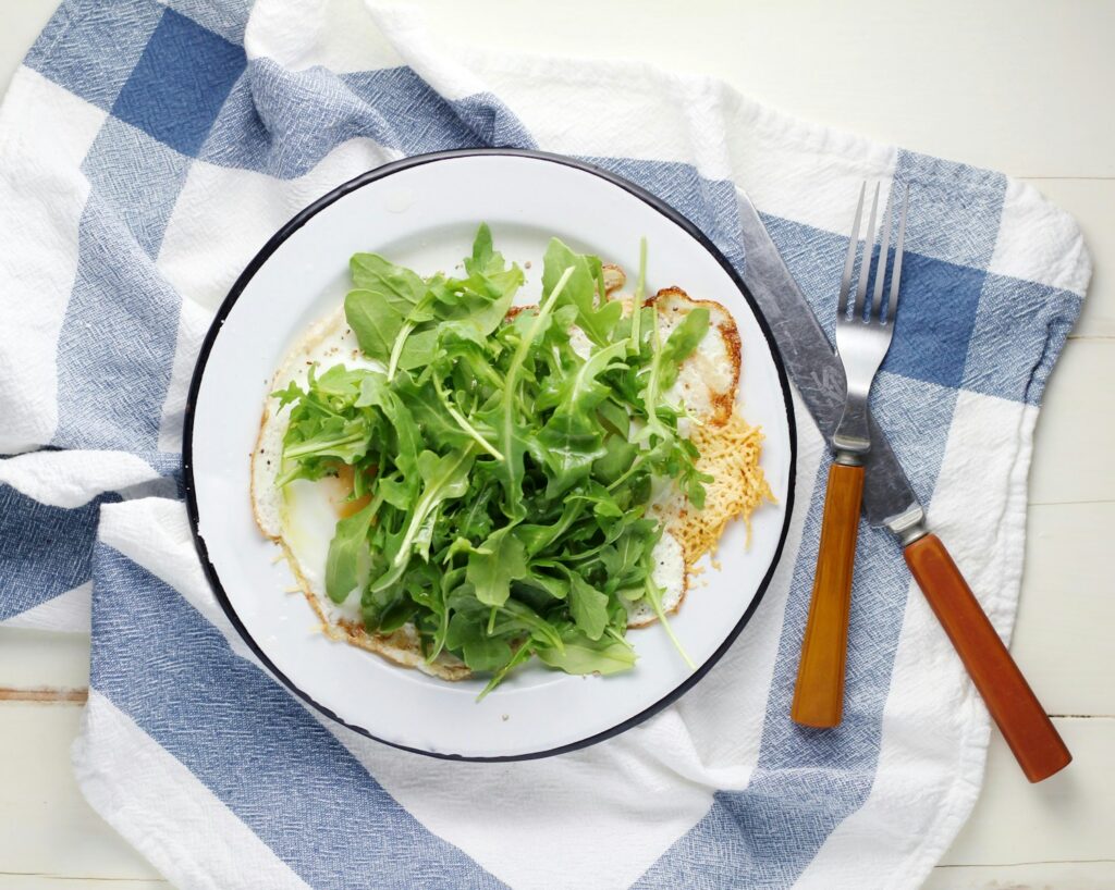 Arugula vegetable served on plate