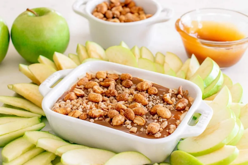 Sliced green apples with caramel dip