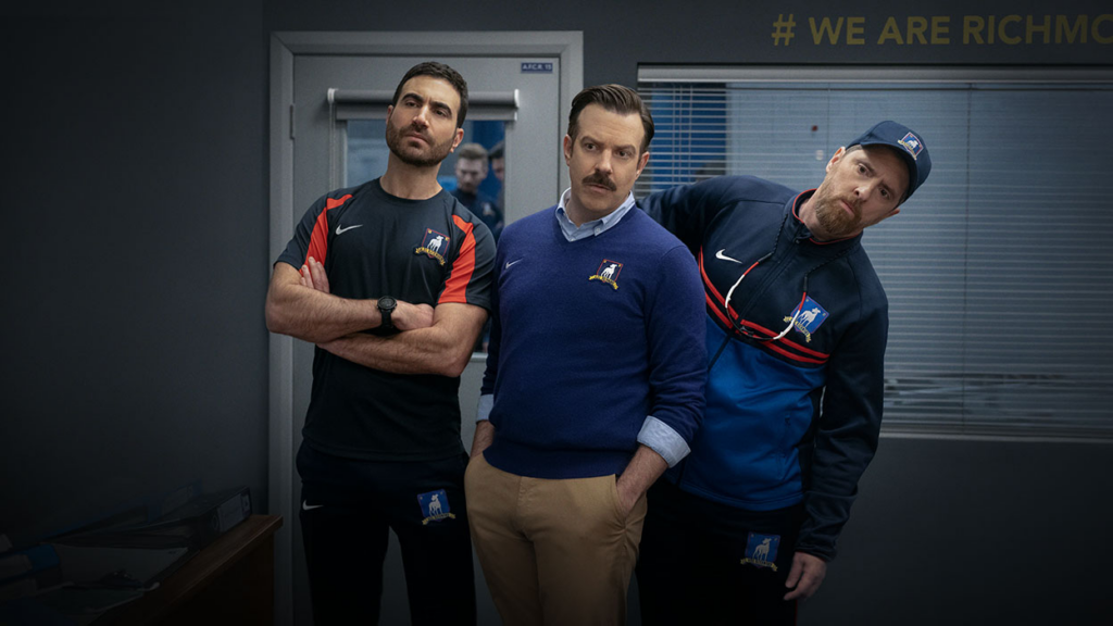Ted Lasso, Coach Beard, and Roy Kent looking confused