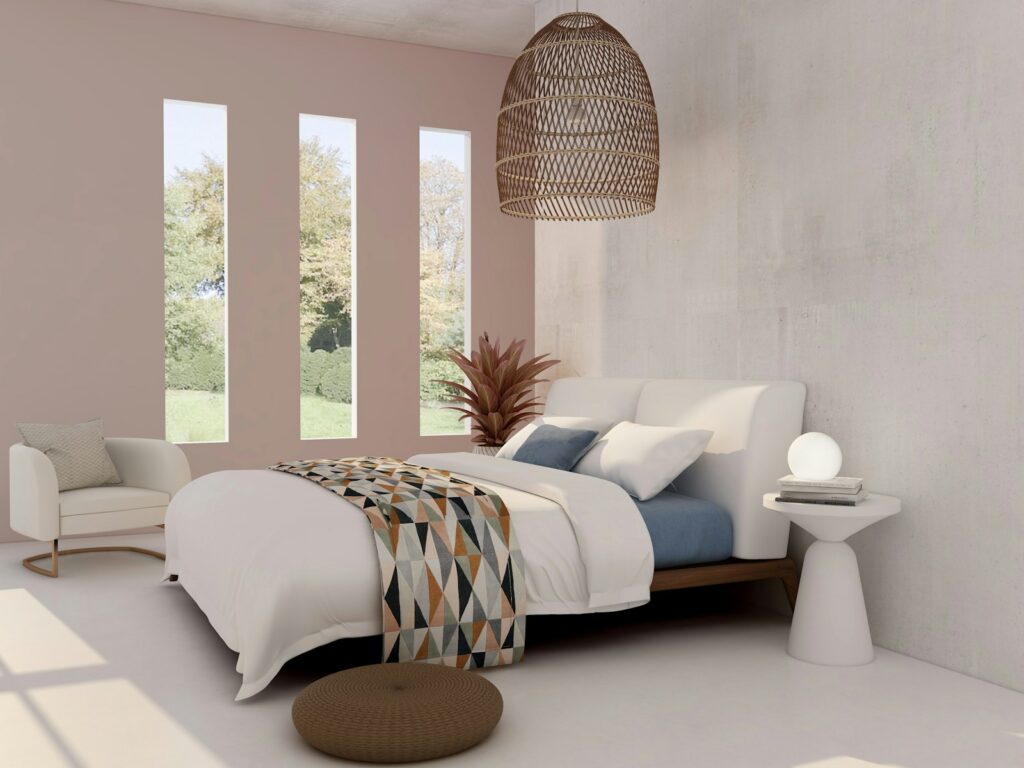 Tidy minimalist room with white and blue bed linen