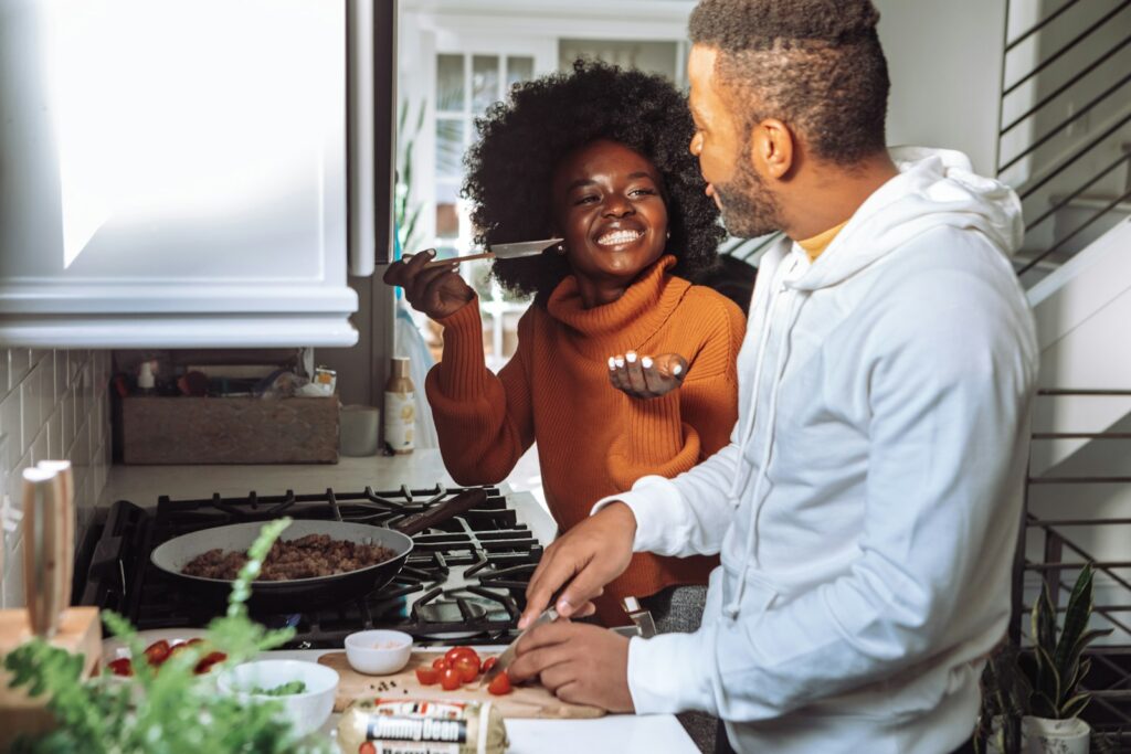Happy couple cooking together