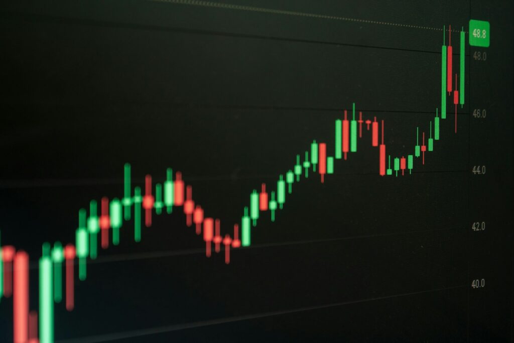 Stock chart indicates growth and potential profit.