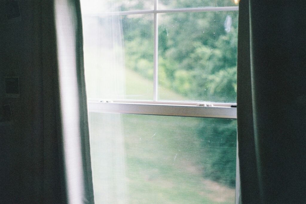 white framed glass window during daytime
