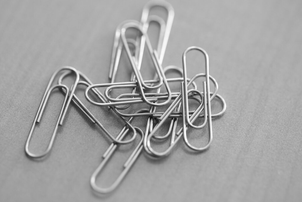 Collection of paper clips on office table