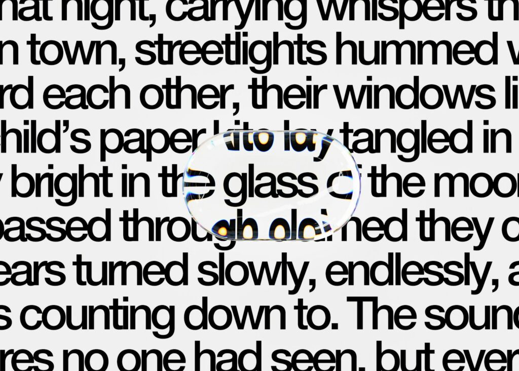 A text snippet focused through a magnifying glass.