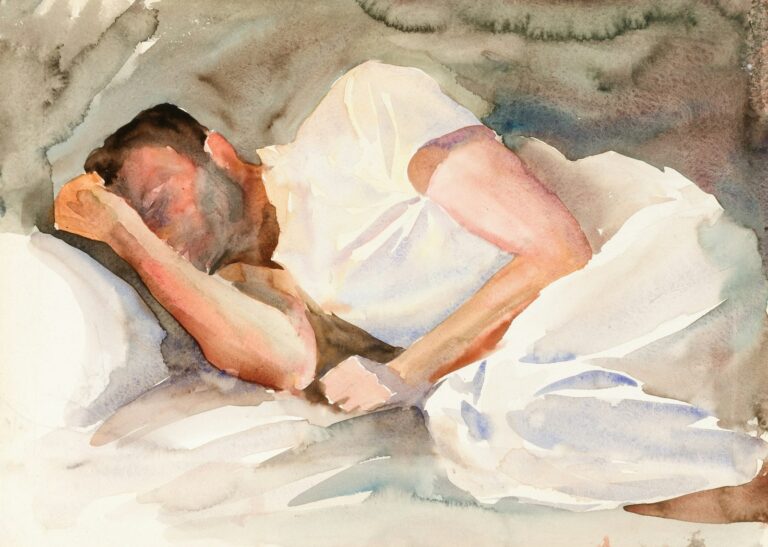 A man sleeping peacefully in bed